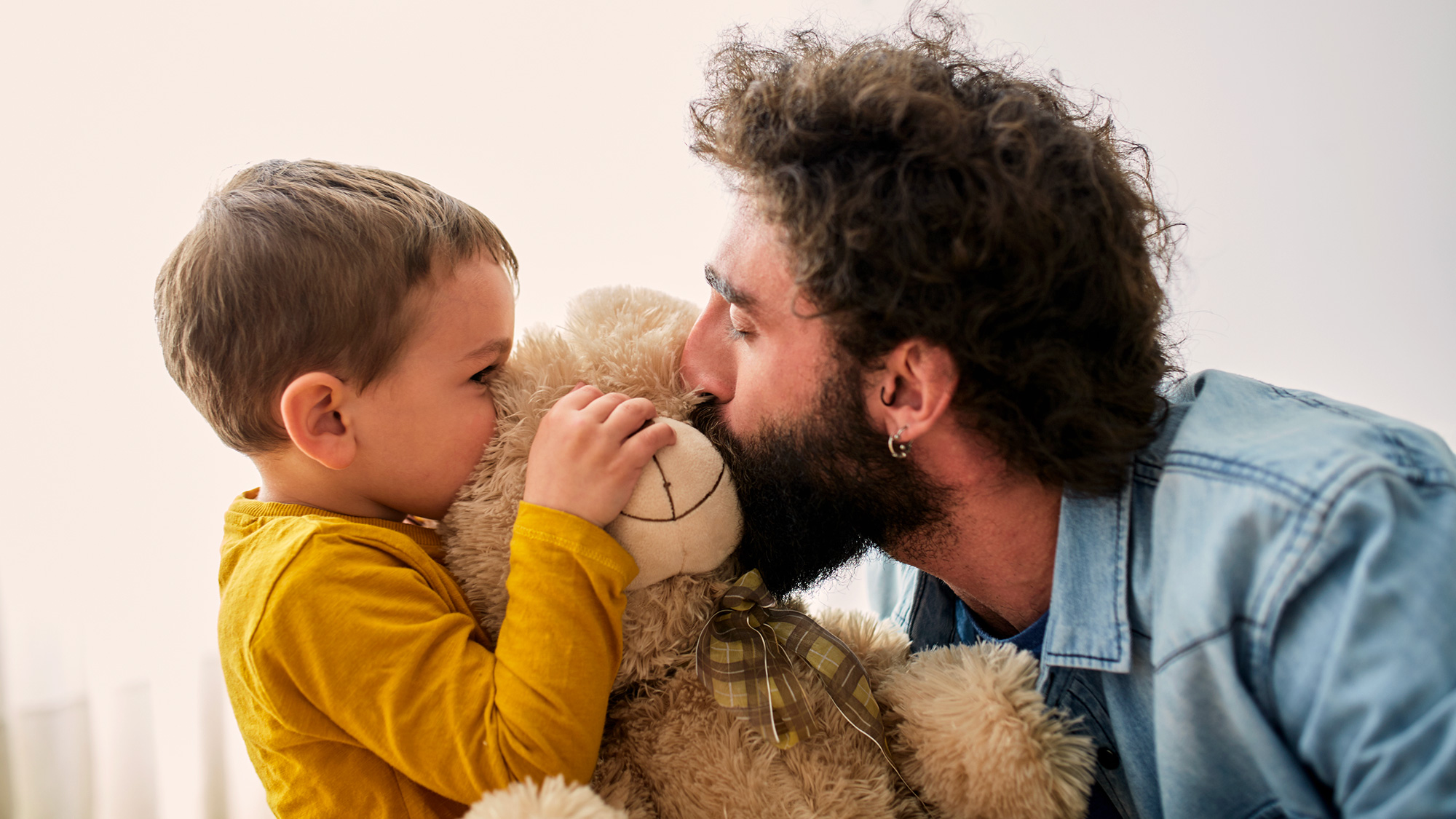 A dad playing with his son